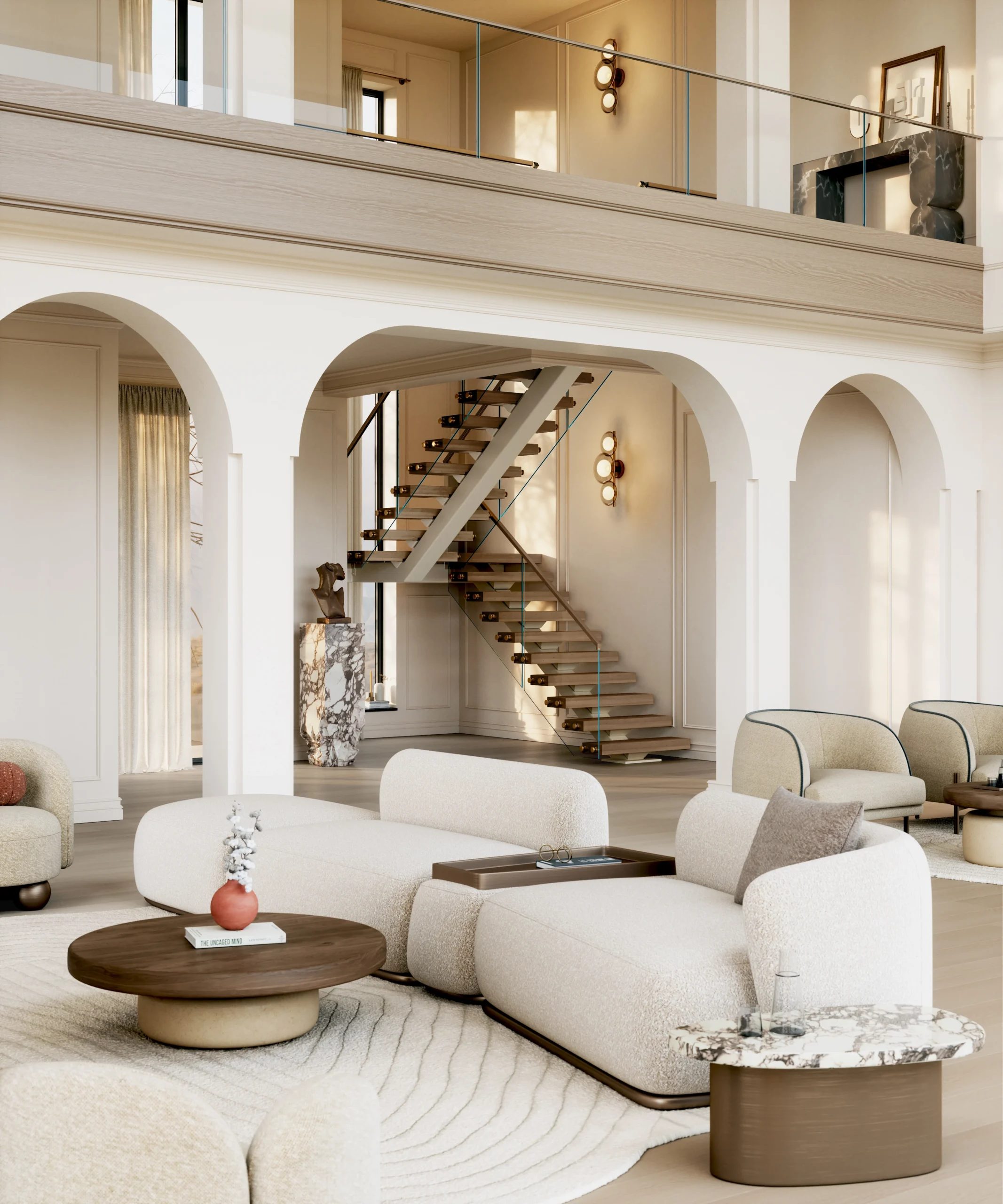 A stair with glass railing crosses above a curved sofa in an arched room