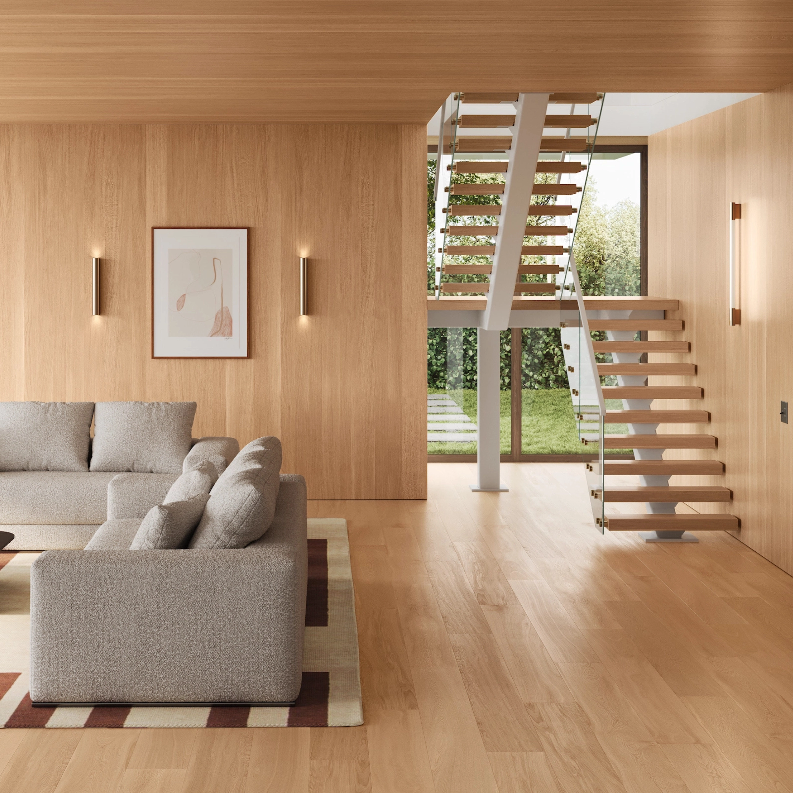 Pale wood wraps a living room where a floating stair rises at the far end