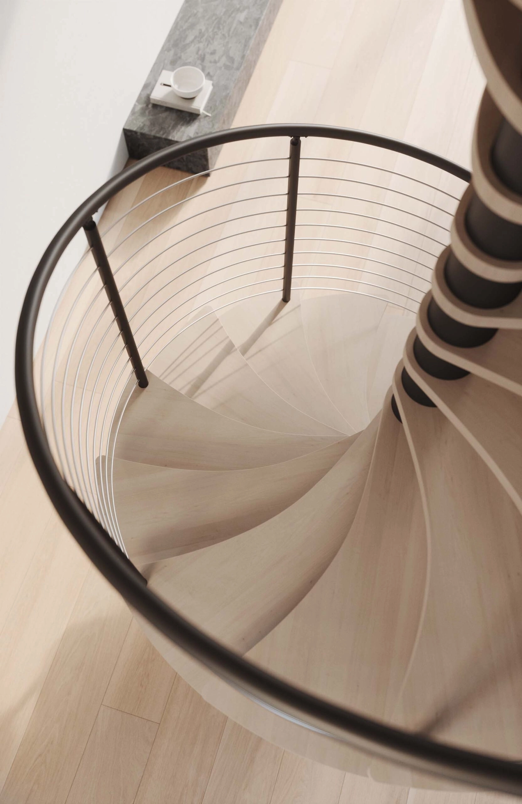 Render looking down a pale spiral stair wrapped by a thin black handrail