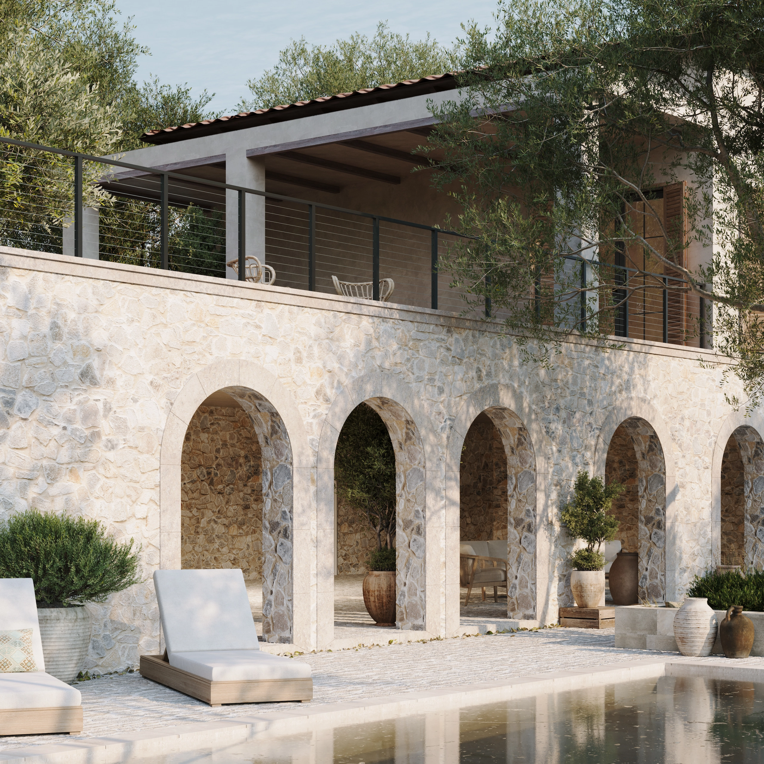Railing edges the upper terrace of a stone villa above an arcaded pool court