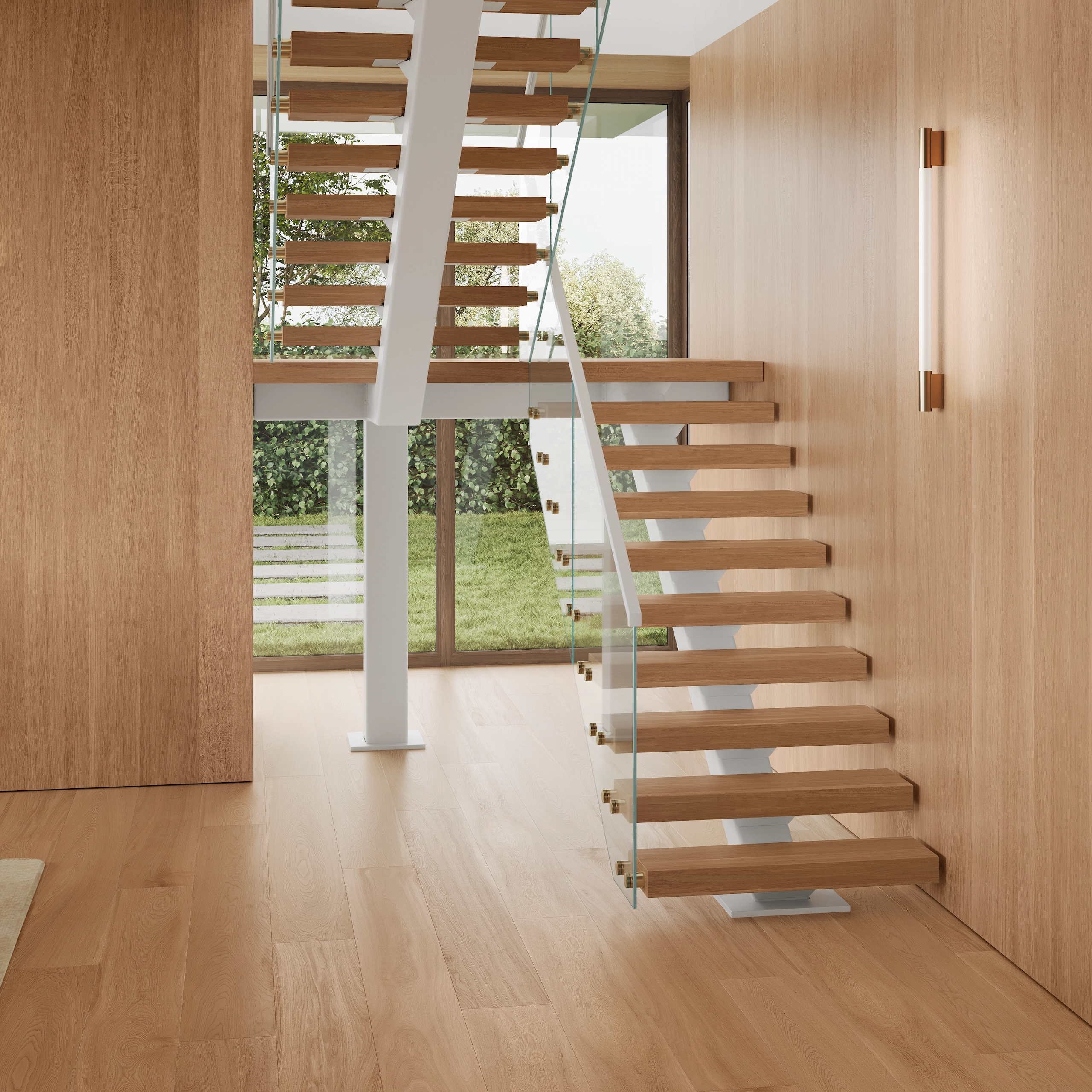Glass panels on standoff pins line a floating stair in a wood-clad room