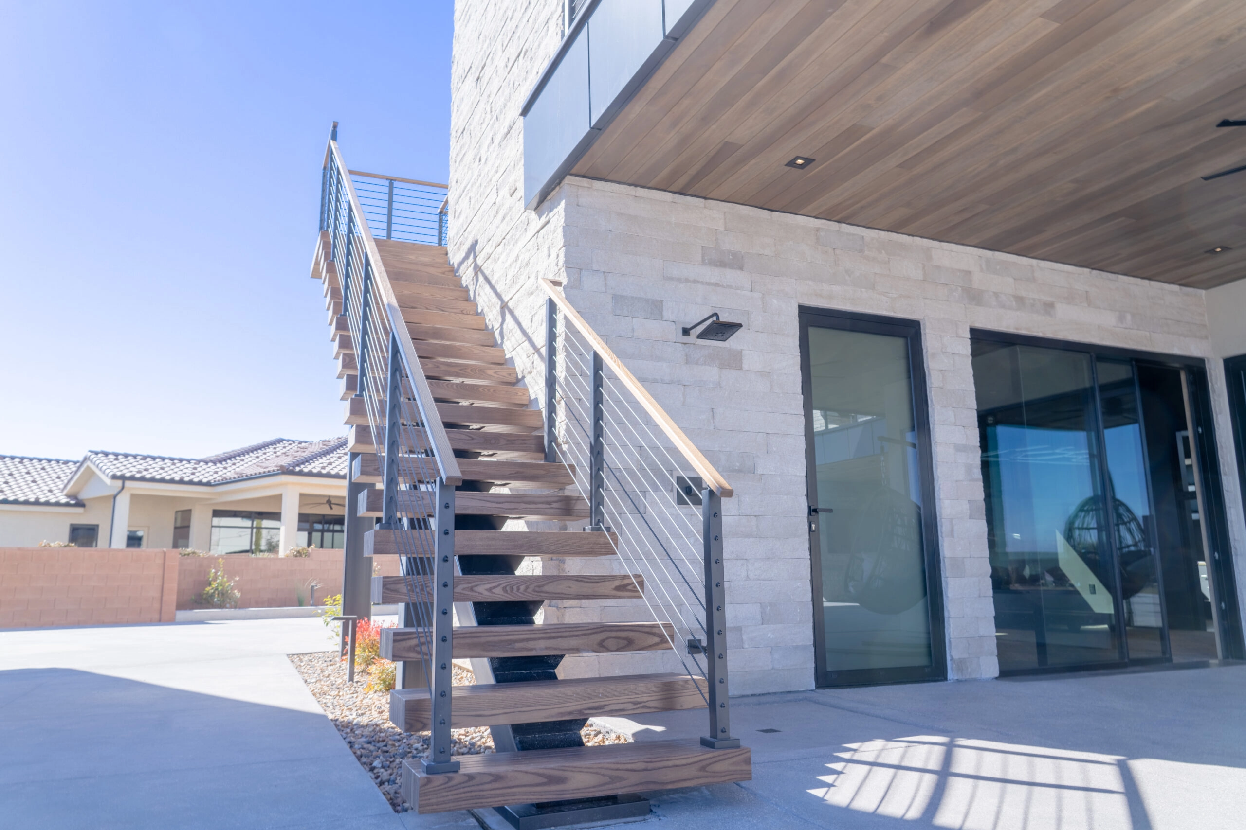 Angled view of the outside flight meeting a concrete patio