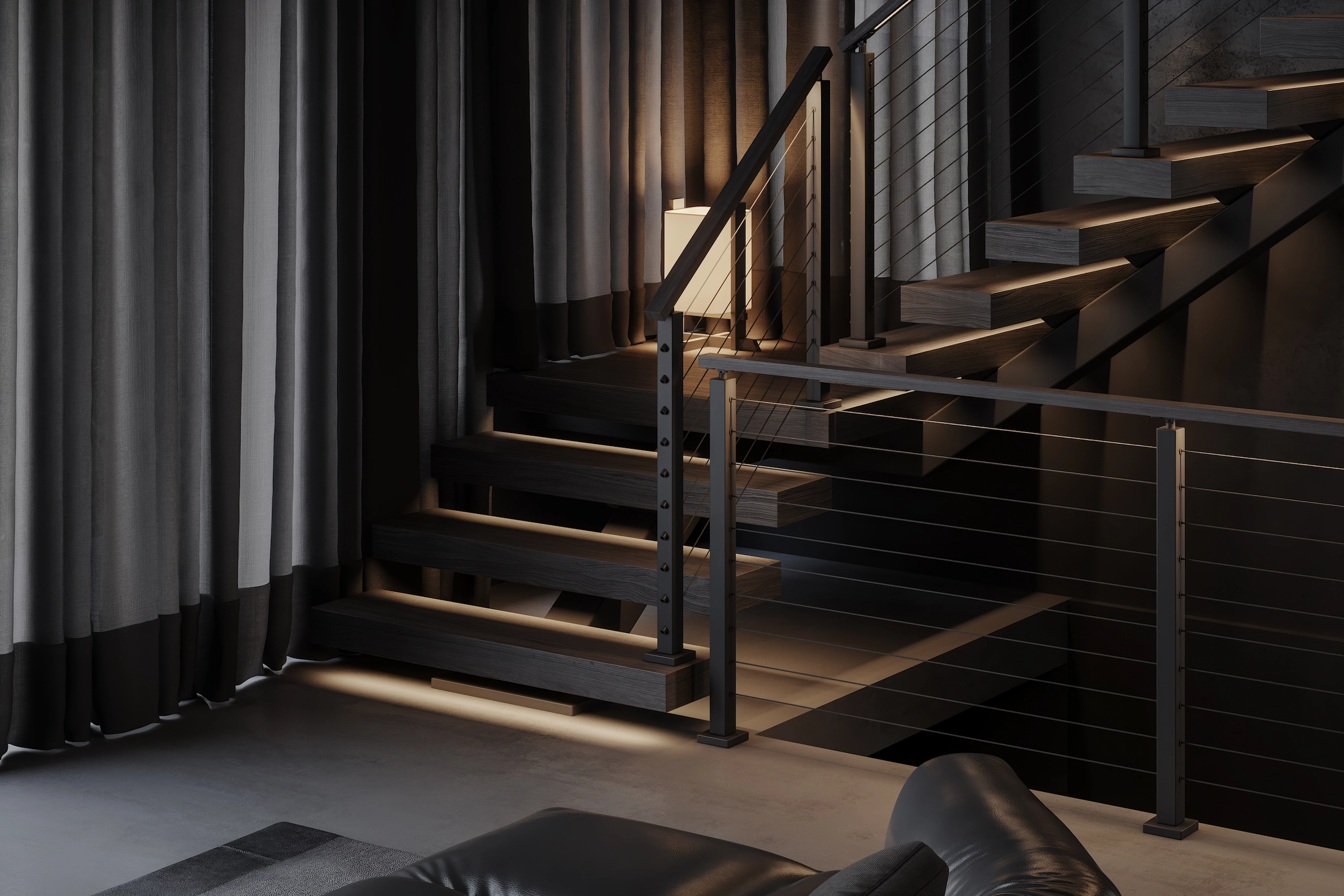 Wide moody room with the stair, drapery and low seating in near darkness