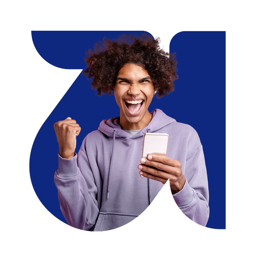 Man in lilac hoodie celebrating 