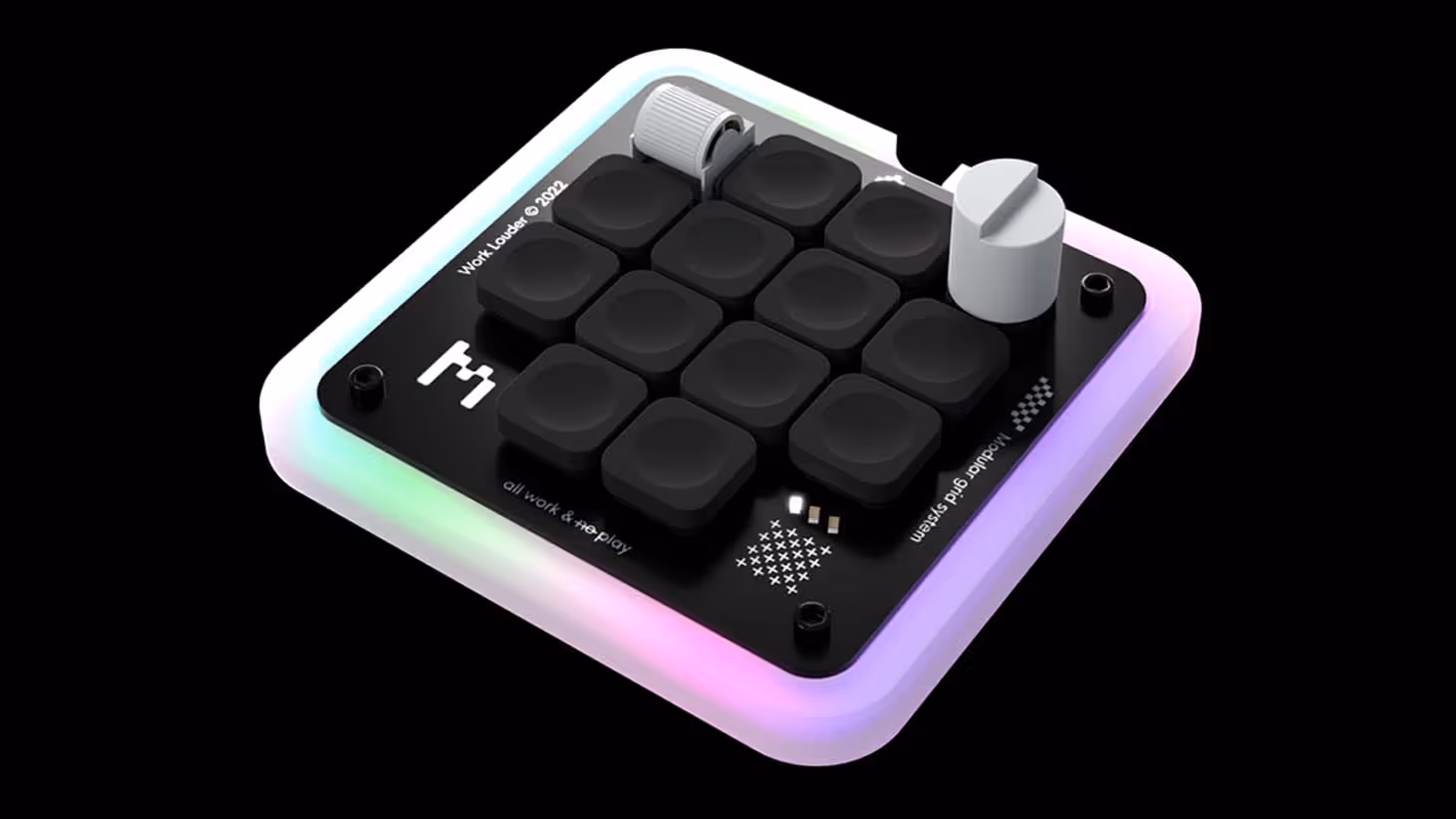 Compact black pad with 12 square buttons, one scroll wheel, and one knob on a glowing pastel frame.
