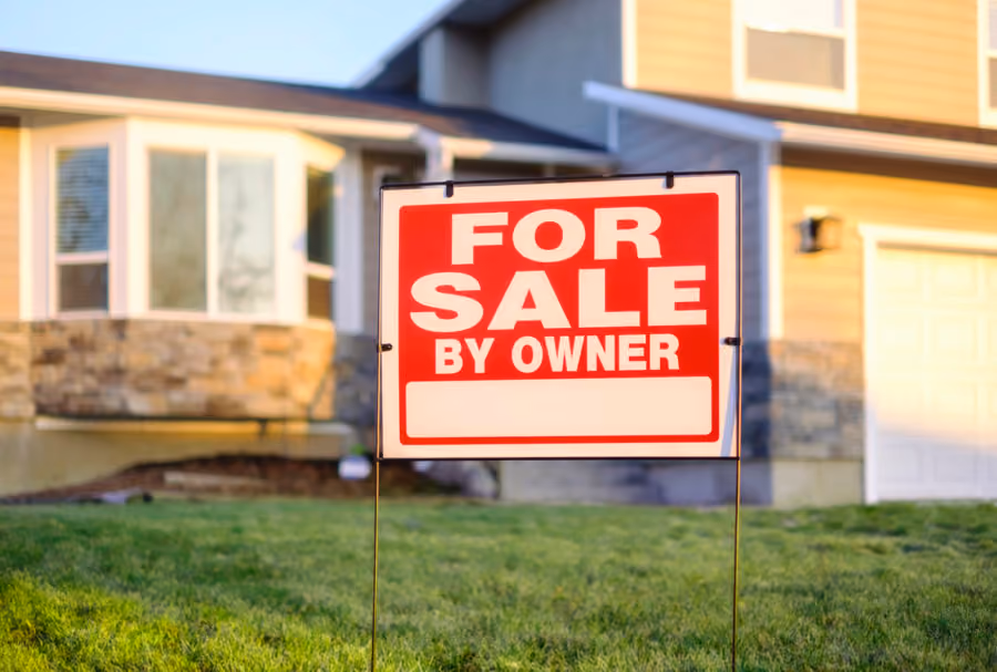 Homeowner reviewing home sale contract without a realtor