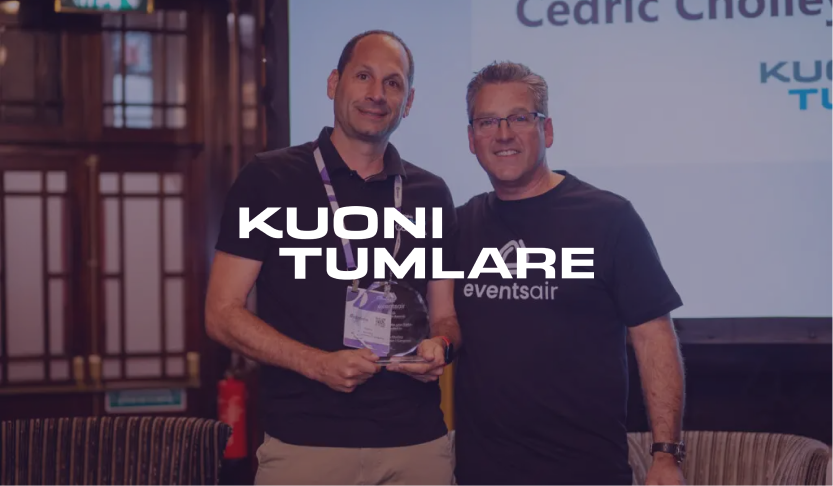 Kuoni Tumlare logo over two men holding an award at an EventsAir event