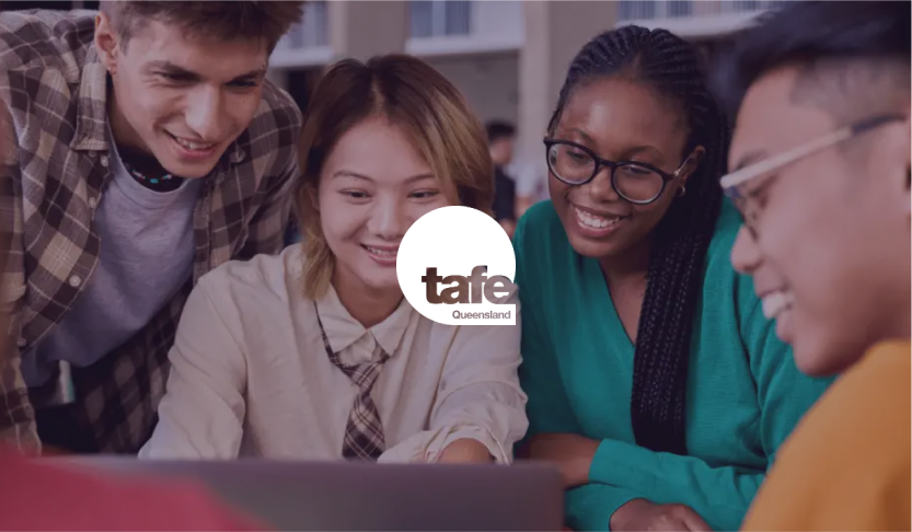 TAFE Queensland logo over four smiling students gathered around a laptop