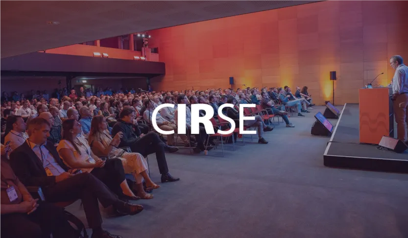 CIRSE logo over a full auditorium listening to a speaker at a lectern