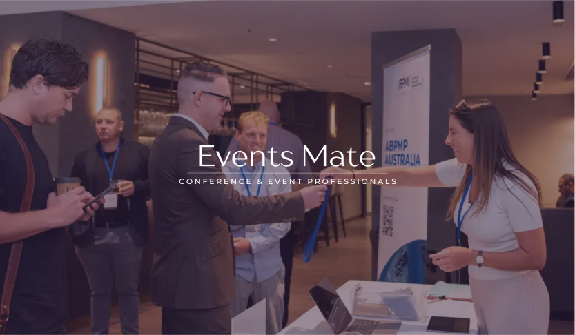 Events Mate logo over a delegate being handed a lanyard at a registration desk
