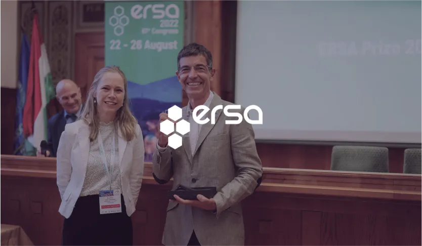 ERSA logo over two people with an award on stage at the ERSA 2022 Congress