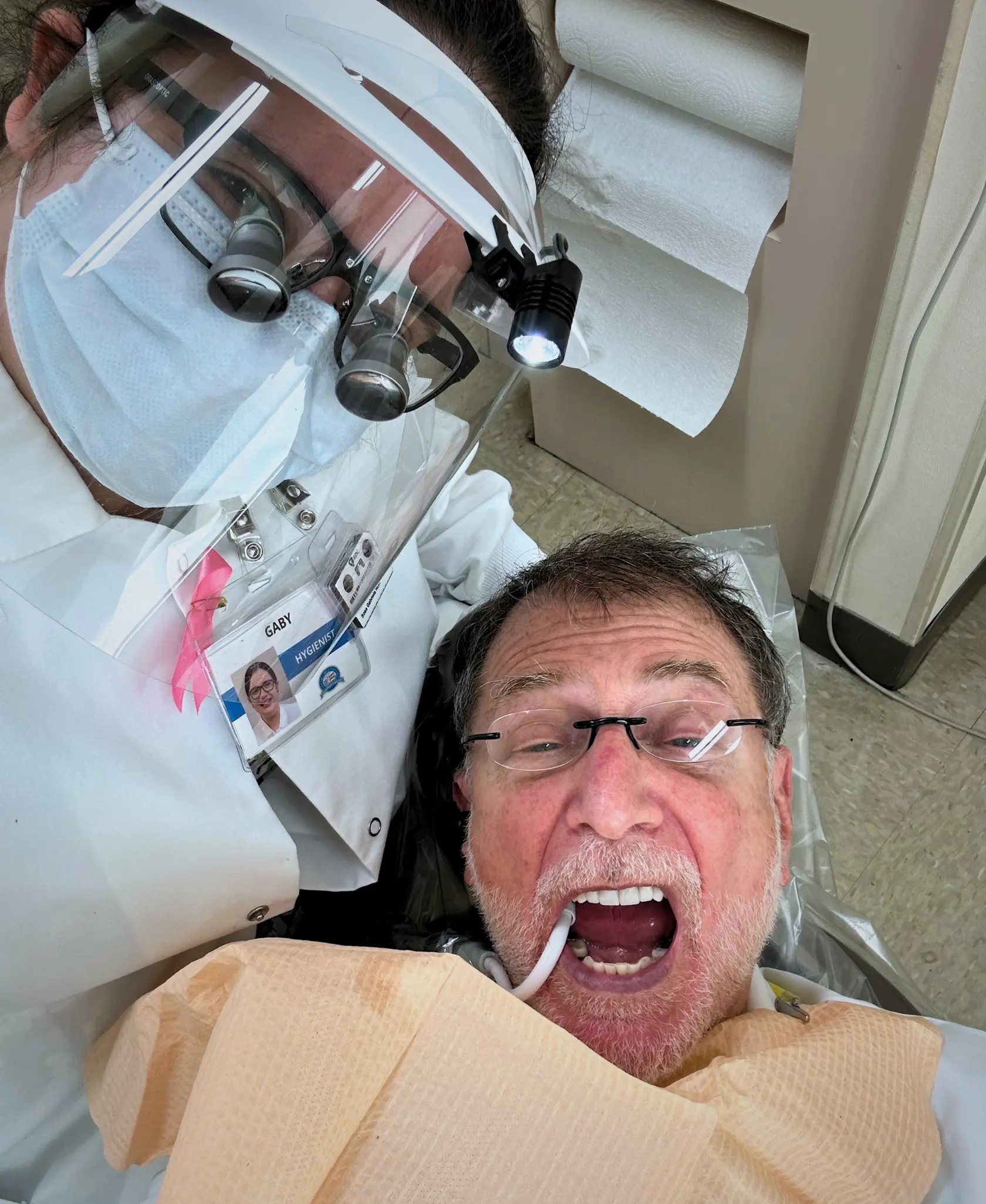 Dental Care Stamford hygienist helping a patient during a comfortable preventive dental visit in Stamford, CT.