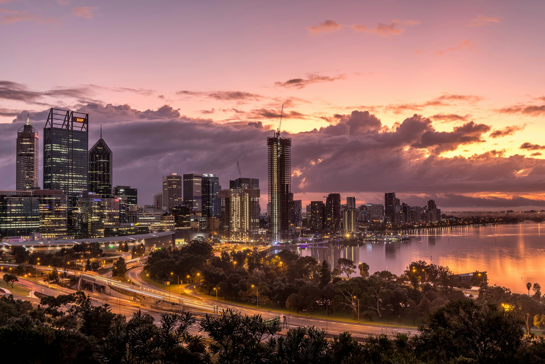 Perth city skyline over the Swan River at sunset, Western Australia
