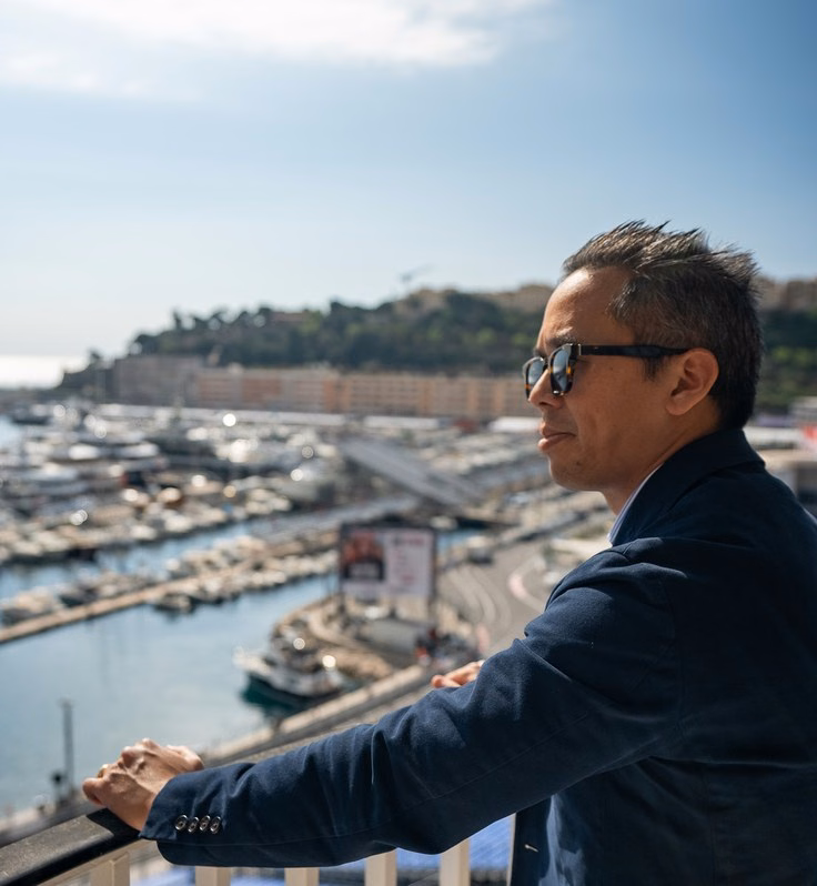 Jérémy, Life Properties agency director, overlooking Port Hercule in Monaco