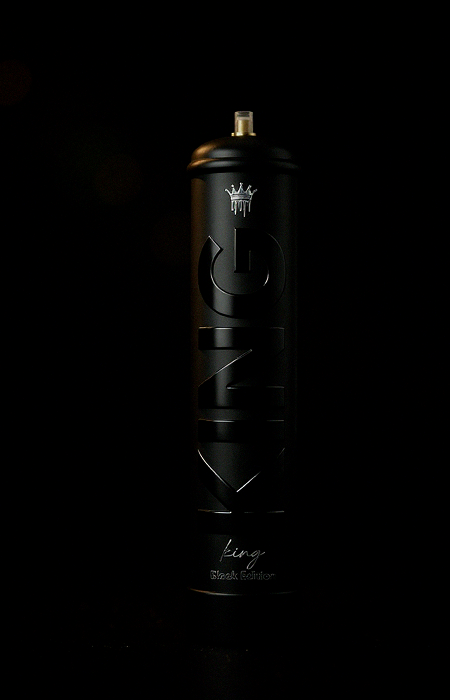 Black spray paint can against a dark background with subtle lighting highlighting the embossed word 'KING', a small crown icon above it, and the phrases 'king' and 'Black Edition' at the bottom.