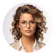 Portrait of a woman with curly hair and round glasses wearing a white shirt.
