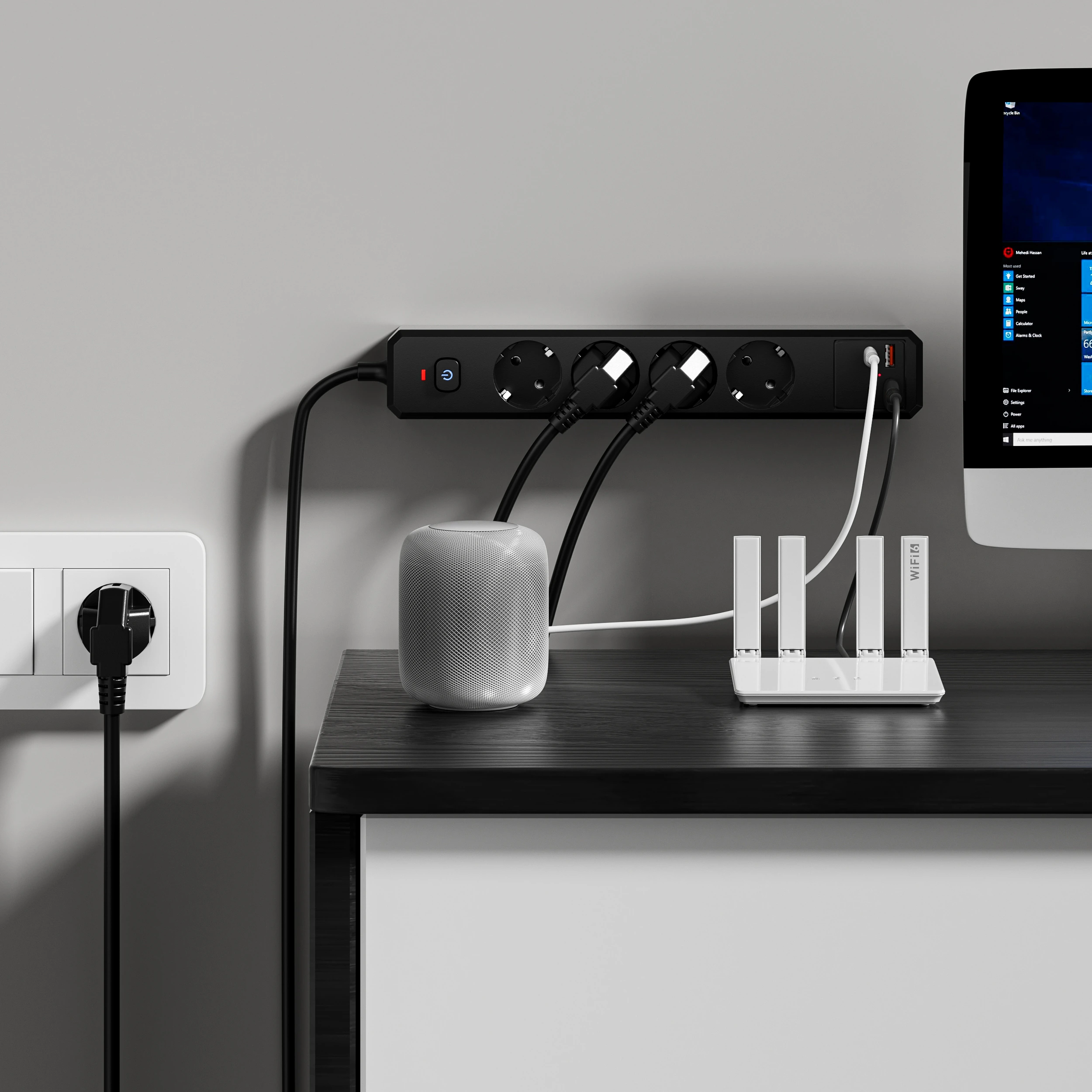 XR-EU-A4U power strip beside office equipment