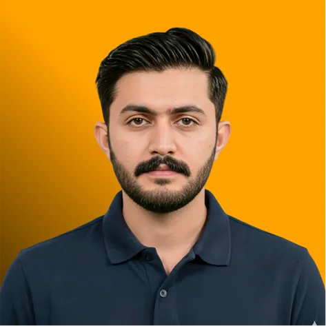 Portrait of a man with dark hair and beard wearing a navy blue polo shirt against an orange background.