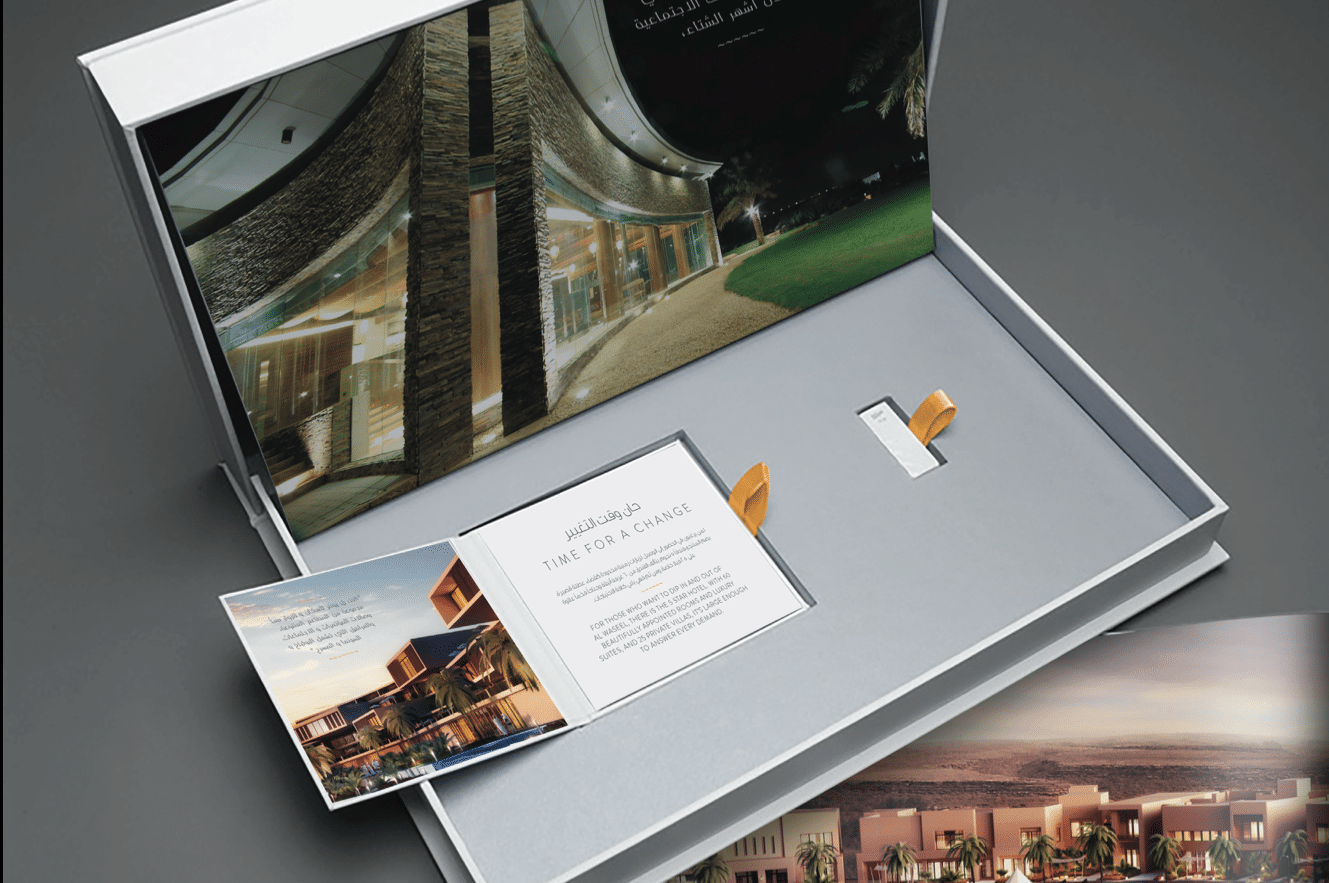 The Al Waseel brochure open to a resort photograph with a Time for a Change insert | Luxury Resort Brand Strategy and Identity, Al Waseel