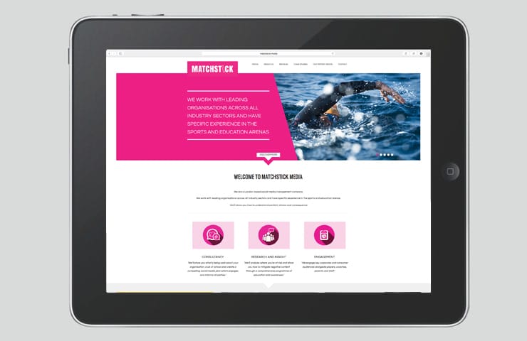 The Matchstick Media website on a tablet, with an open-water swimmer hero image | Sports and Education Brand Creation