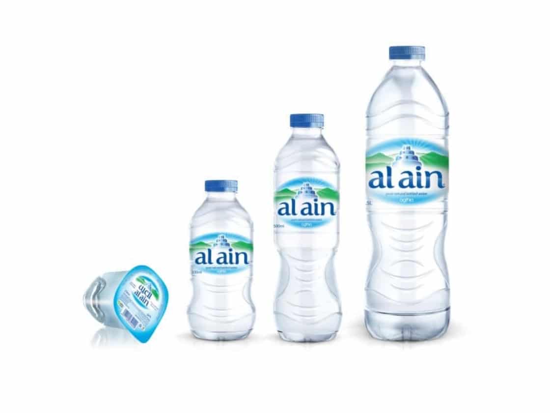 The Al Ain bottled water range in four sizes with the mountain label | Water Brand Strategy and Packaging Design, Al Ain