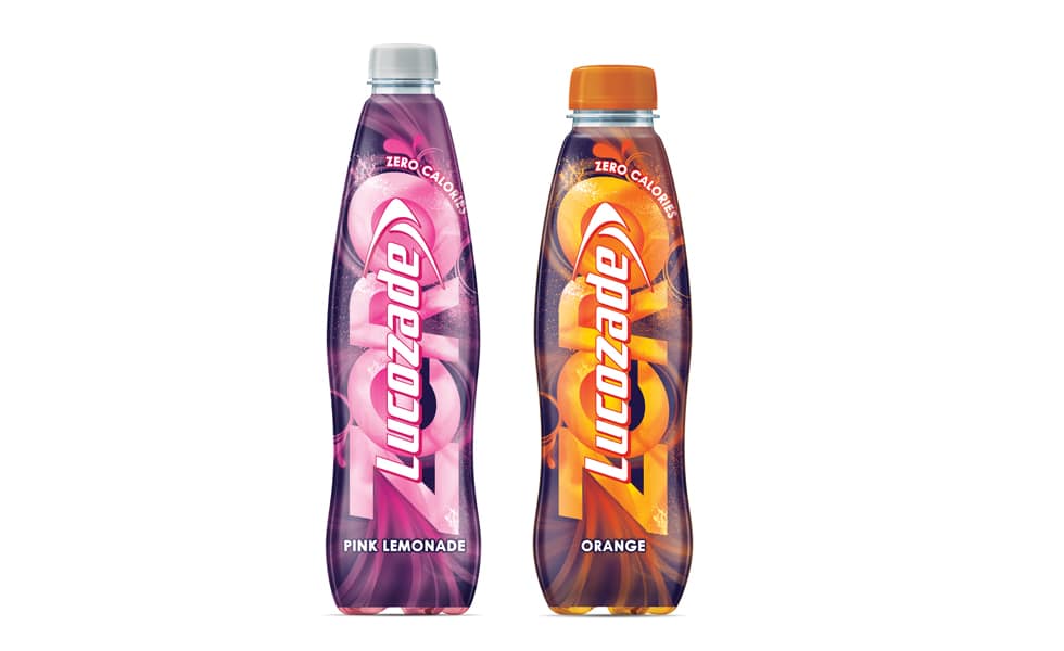 Lucozade Zero pink lemonade and orange bottles side by side.