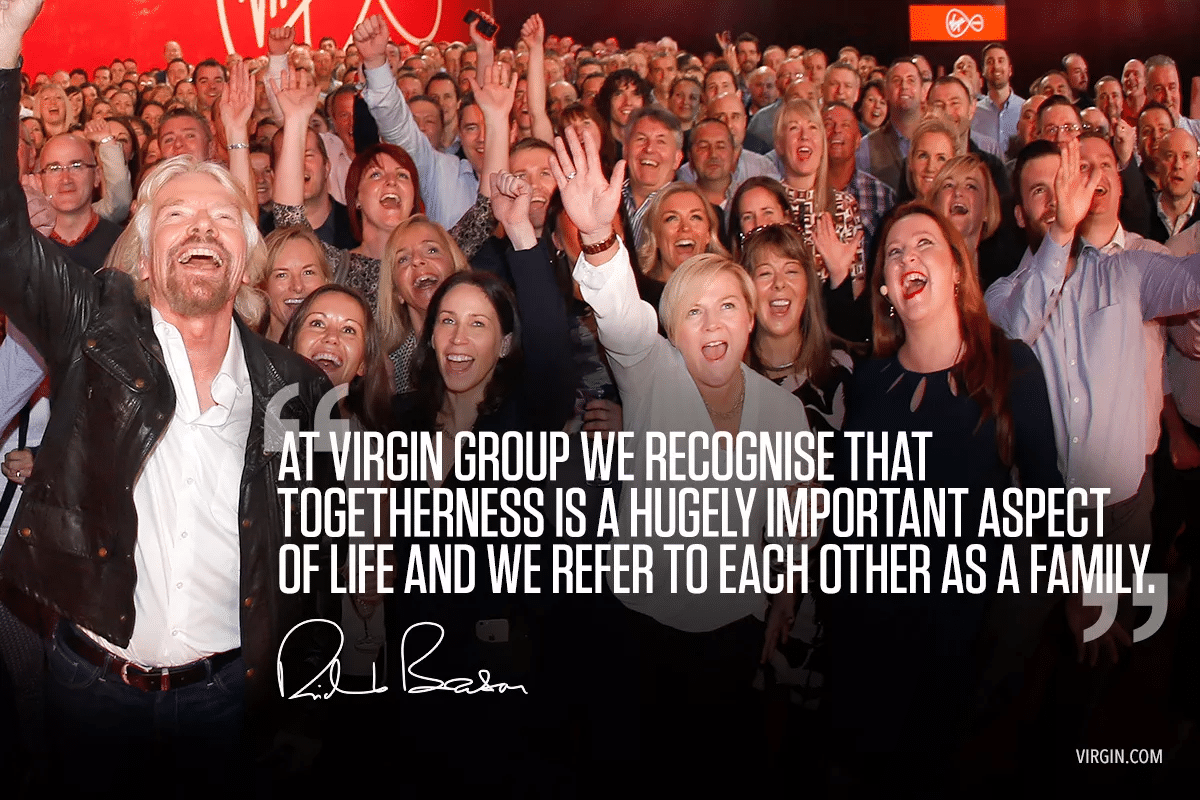 Richard Branson among a cheering crowd, beside a quote on togetherness at Virgin Group.