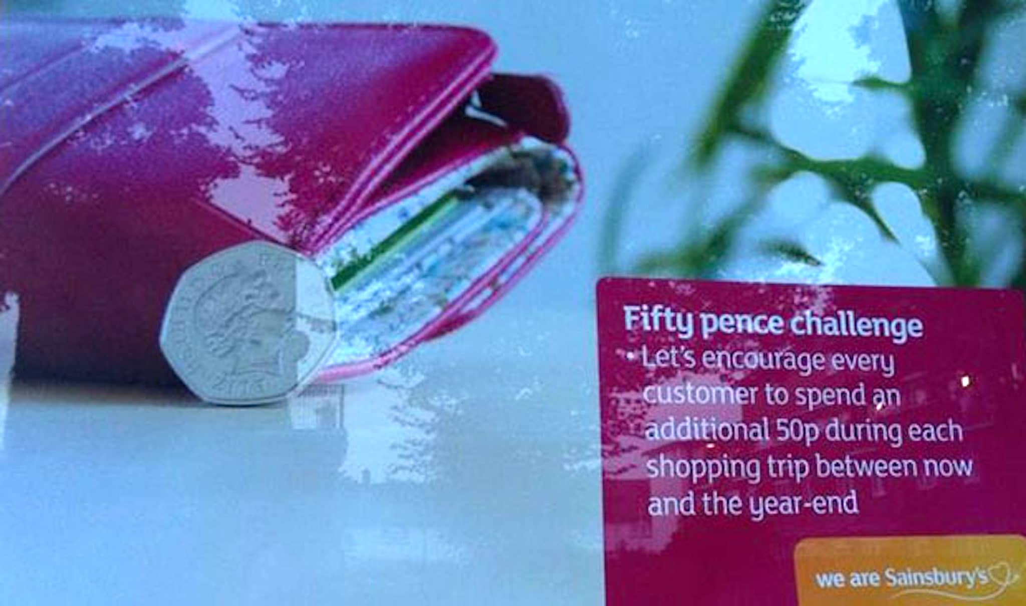 Sainsbury's Fifty Pence Challenge point-of-sale graphic, showing a fifty pence coin beside a purse.