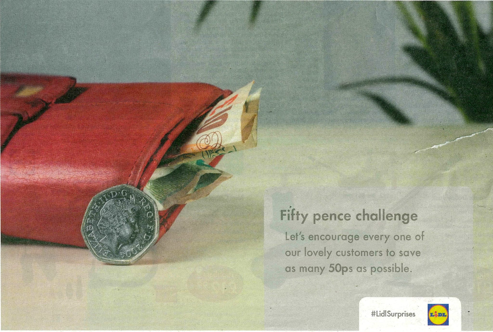 A Lidl Fifty Pence Challenge panel encouraging customers to save as many fifty pence pieces as possible.