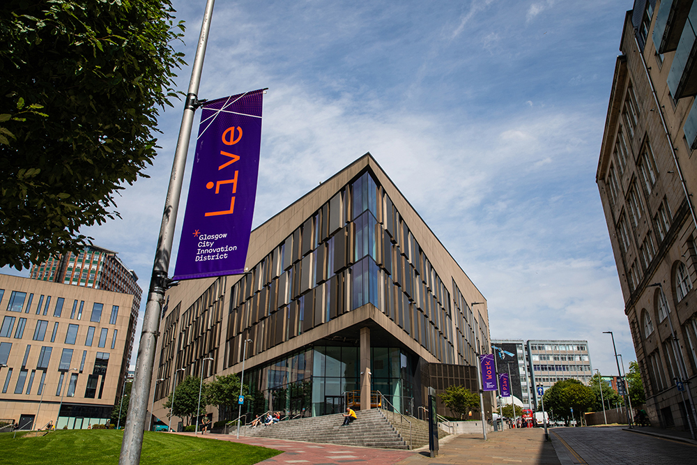 Professionals working in Glasgow, illustrating how city branding helps attract businesses, skilled talent and innovation.