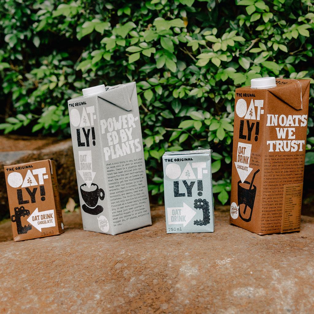 Oatly product range demonstrating distinctive food and beverage branding and packaging design.