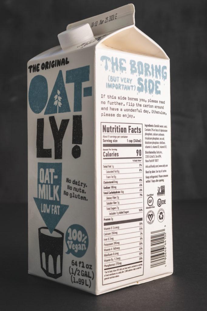 Oatly carton demonstrating distinctive packaging design, verbal identity and brand communications.