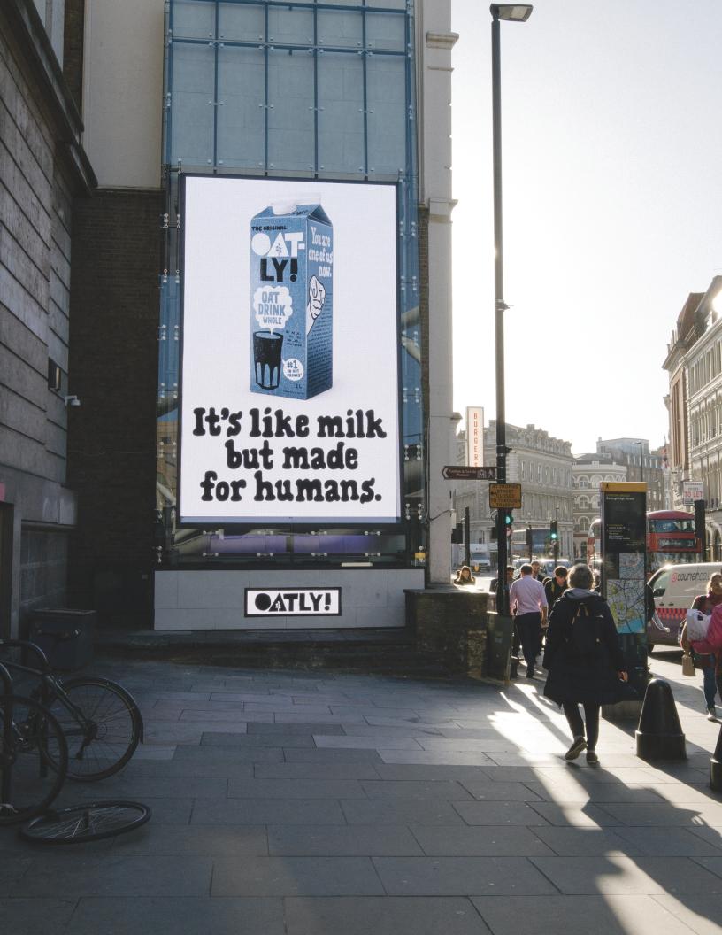 Oatly outdoor advertising demonstrating consistent visual and verbal brand identity.