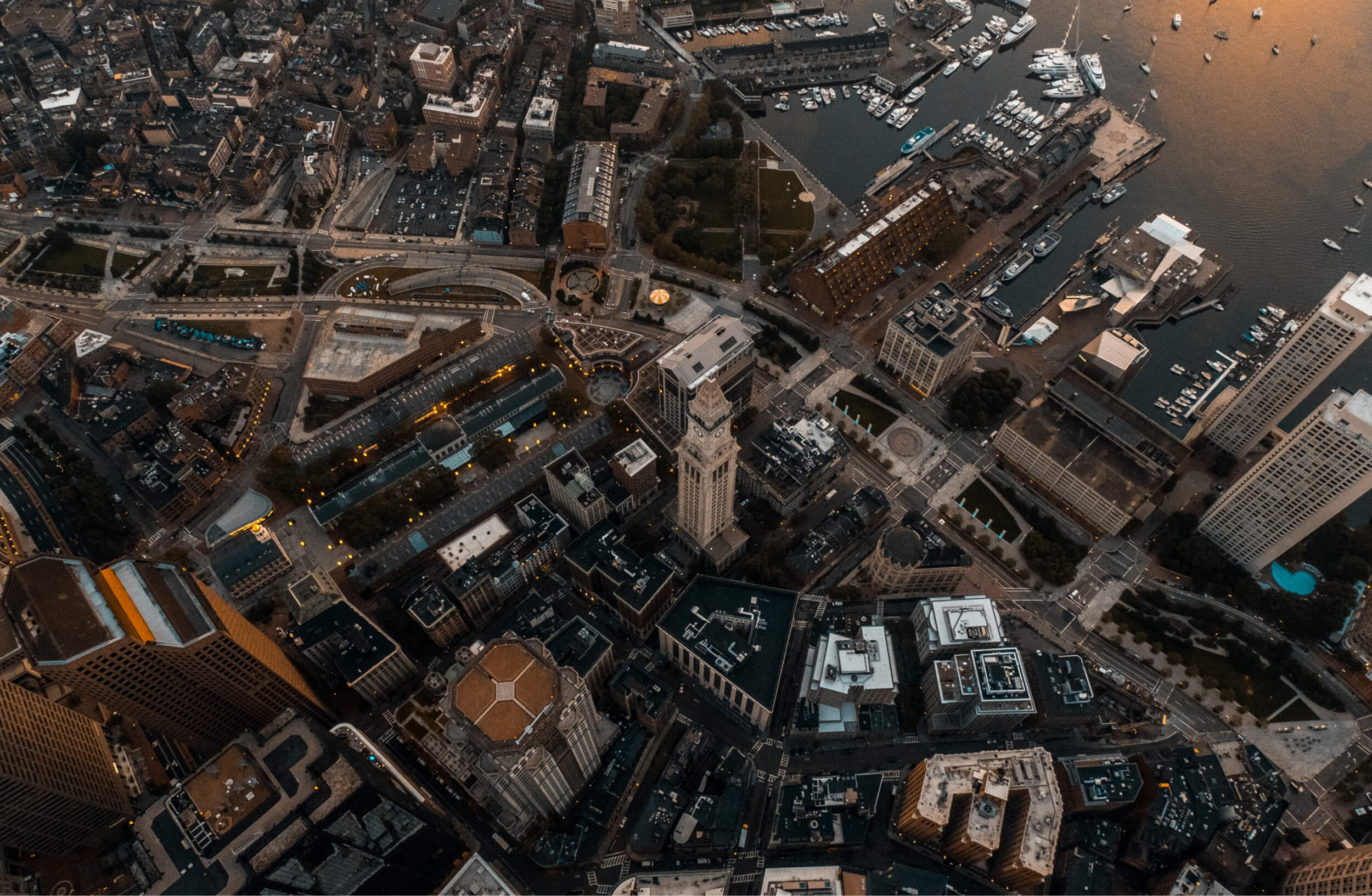 An aerial view of a dense city centre and its waterfront | Government and Public Sector