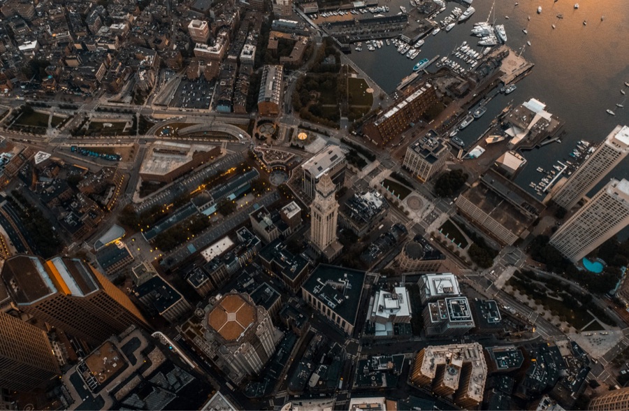 An aerial view of a dense city centre and its waterfront | Government and Public Sector