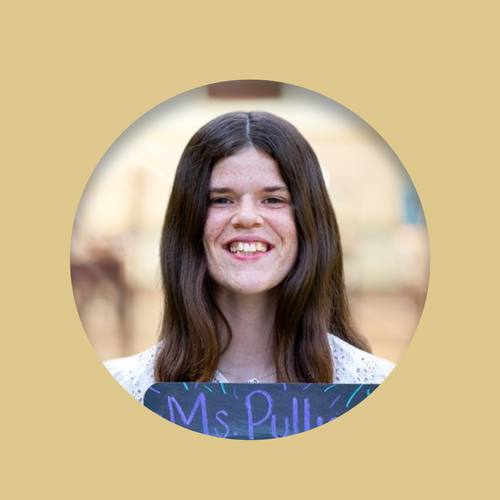 Ms. Pull smiling staff portrait photo on school website