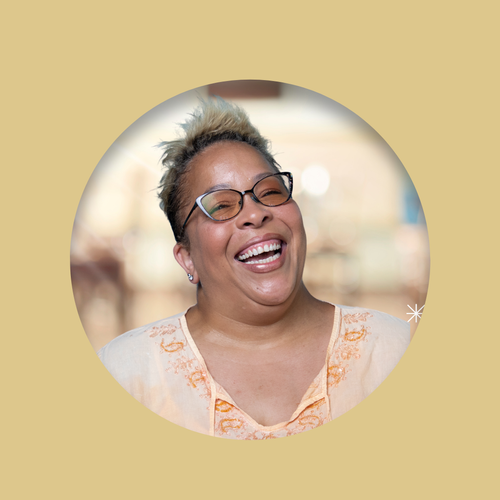 Shana Harris smiling warmly in staff directory photo