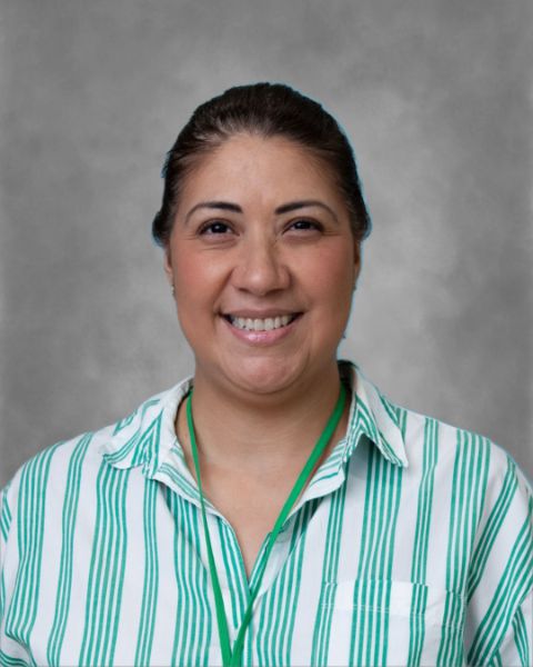 Christina Nunez smiling in staff portrait photo