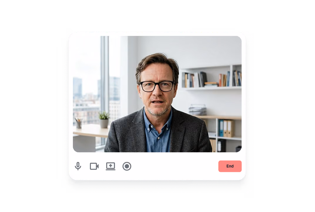 Man with glasses speaking in a video call interface with office background and End button.