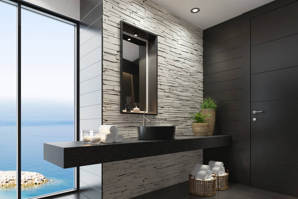 Luxurious modern home spa bathroom with matte white stacked stone wall and squared black matte mirror Trendy and modern home spa bathroom with matte black tiles, white stacked stone wall and lots of natural light. Cozy interior. Modern black bath tub and sink. Black and white concept. Candles light. Big panoramic windows. Black stone floor. 3d rendering.+++background is my photo med spa stock pictures, royalty-free photos & images