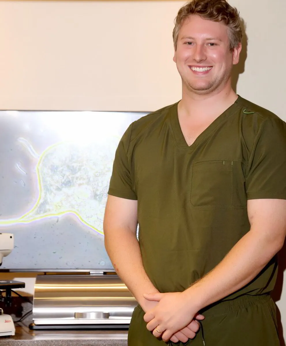 Doctor posing for picture smiling