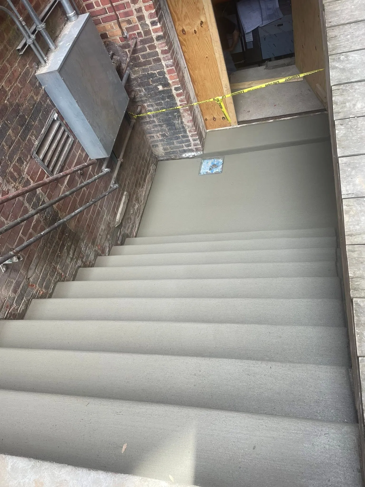 Finished commercial concrete stairwell and landing completed by CES Construction