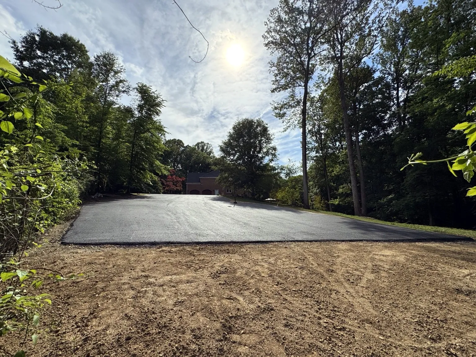 Large residential asphalt driveway completed by CES Construction