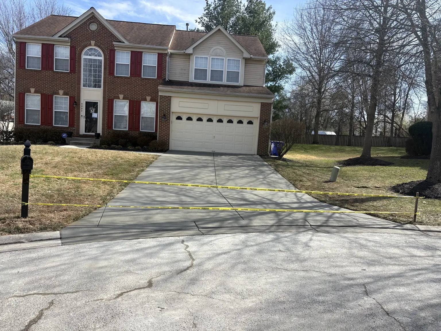 Finished residential concrete driveway completed by CES Construction