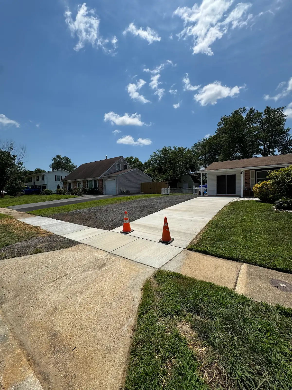 CES concrete driveway and adjoining sidewalk