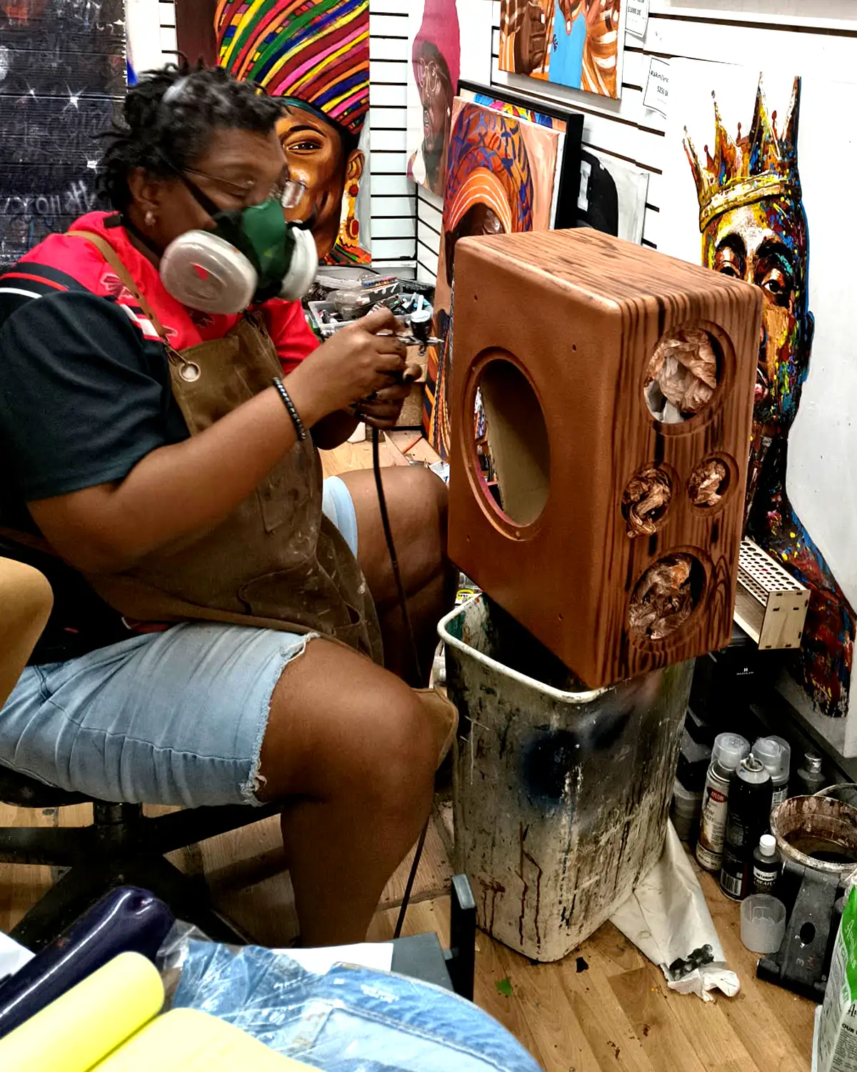 Artist at work on White Gloves piece