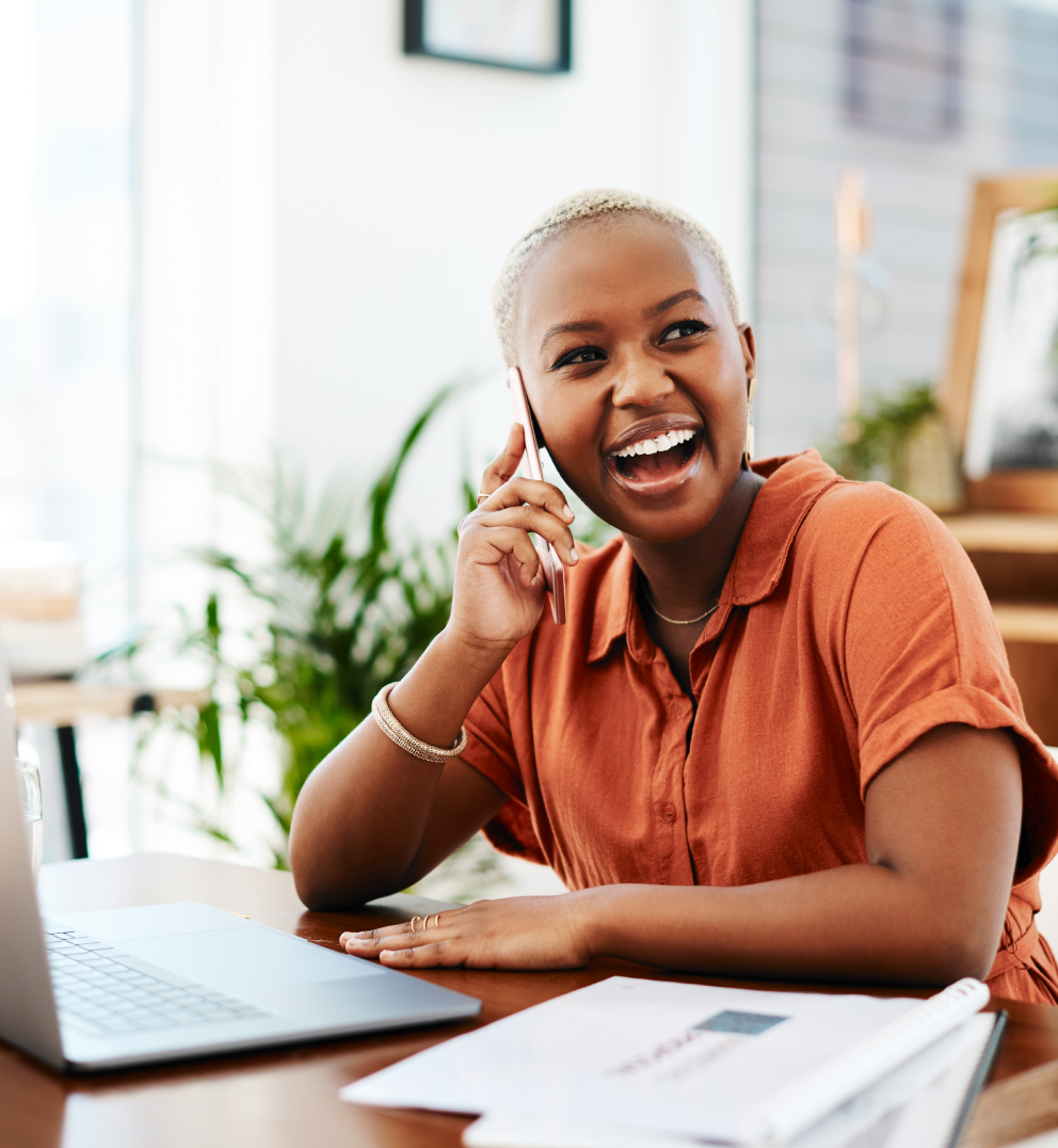 Woman on a phone call at her desk