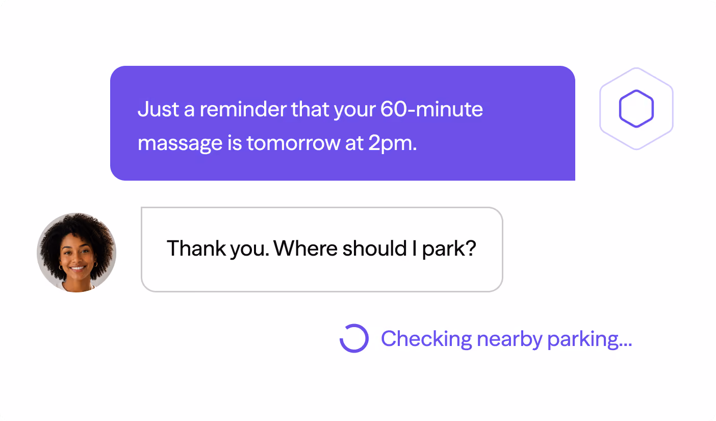 Text message reminder of 60-minute massage tomorrow at 2pm and reply asking where to park.