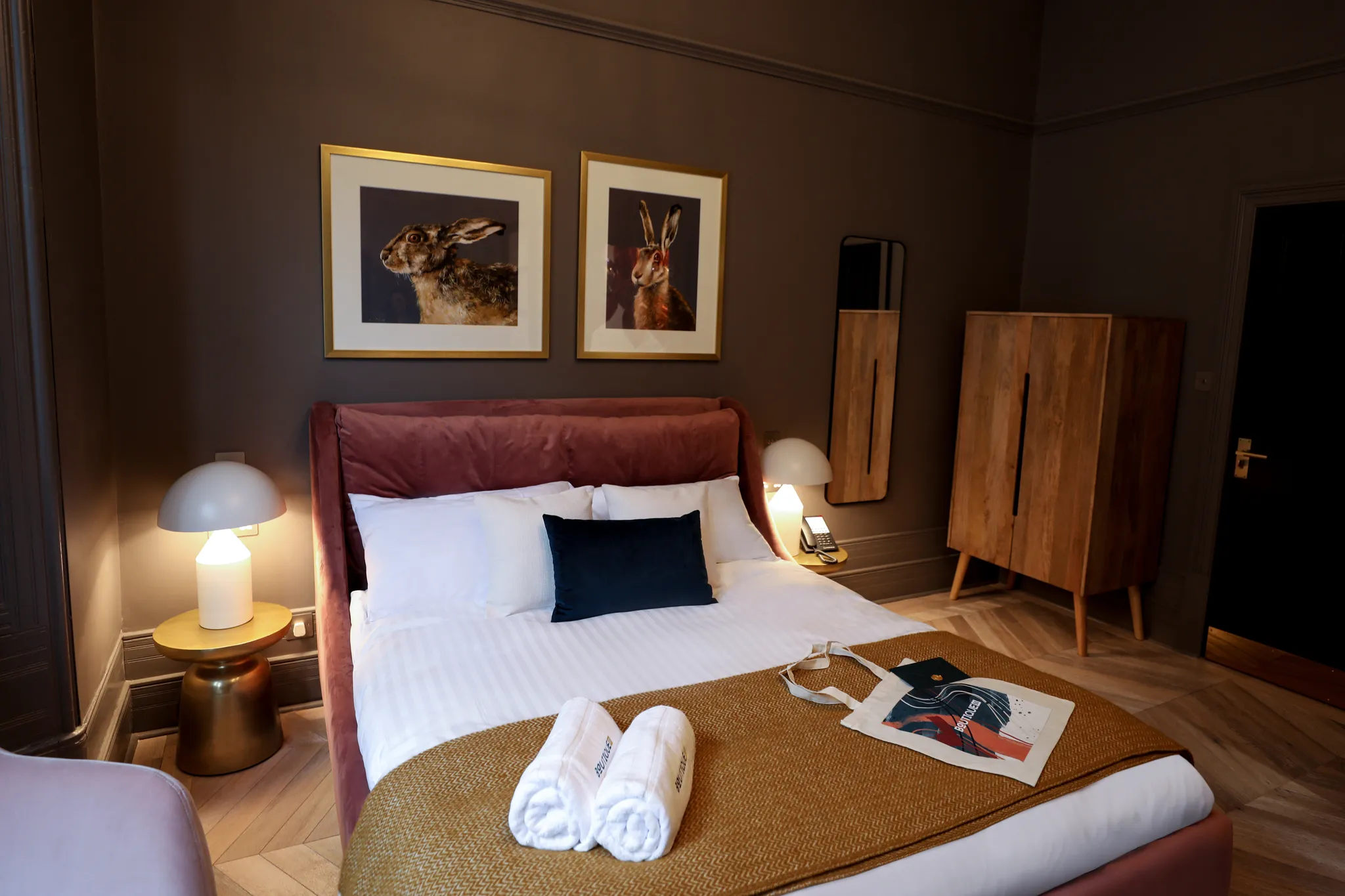 Boutique 50 hotel in Glasgow's West End — stylish boutique room with individually designed decor and warm lighting.