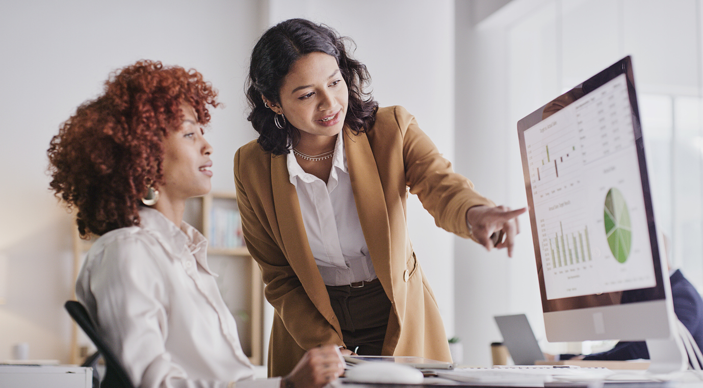 Two Business Women Discussing a Waste Audit